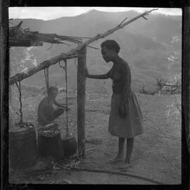 Women Watching Pots Cooking