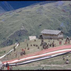 Lengths of Cloth Running Through Mountainside Village