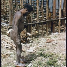 Man Standing Outside Partially Constructed Buildings