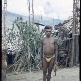 Man Standing Outside a Building