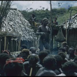 Group Gathered Outside Buildings