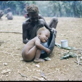 Woman Sitting with a Child