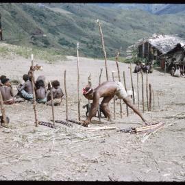Man Preparing Food Distribution Piles