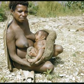 Woman Breastfeeding Child