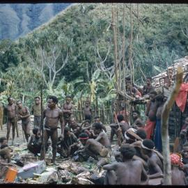 Group Gathered Outside Buildings