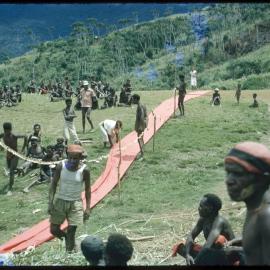 Red Cloth Running Along Ground