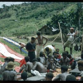 Group Gathered with Lengths of Cloth
