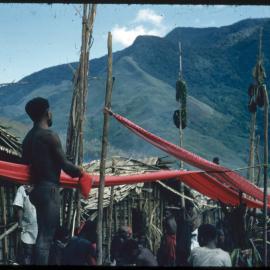 Red Cloth Suspended Through Village