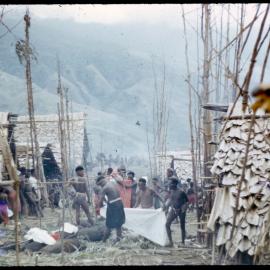 Men Preparing for a Ceremony
