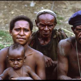 Woman, Child and Two Men
