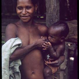 Woman Breastfeeding Child