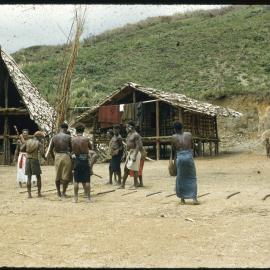 Men Gathered Outside Buildings