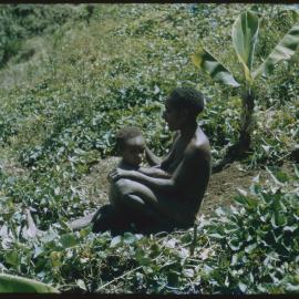 Woman Sitting with a Child