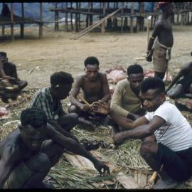 Group of Men Sitting