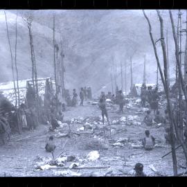 Groups of People Gathered Throughout a Village