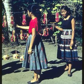 Women with Woven Bags and Shoes