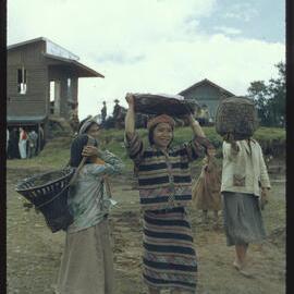 Girls Carrying Baskets