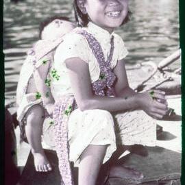 Girl with Baby on her Back