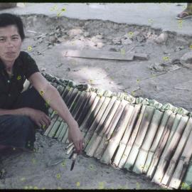 Street Vendor Cooking Cakes, Thailand