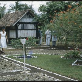 People Walking through a Garden