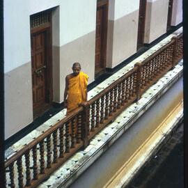 Buddhist Monk on Balcony