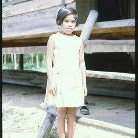 Girl Standing Outside Building