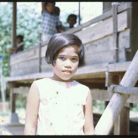 Girl Standing Outside Building