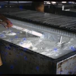 Man Processing Rubber, Malaysia