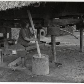 Women by Wooden Structure on Stilts
