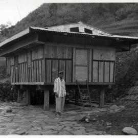 Man Standing by Building