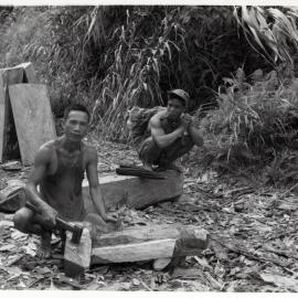 Men Carving Timber
