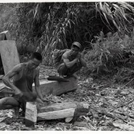 Men Carving Timber