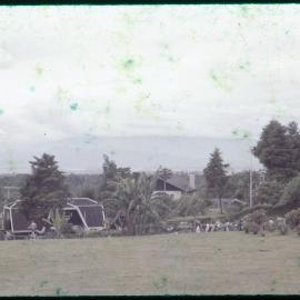 View Across Field with Buildings in Background
