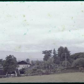 View Across Field with Buildings in Background
