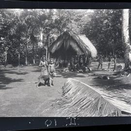 [Manum Island, New Guinea] Maswash, Patipa (Badi’s son) and Jock in Badi’s homestead