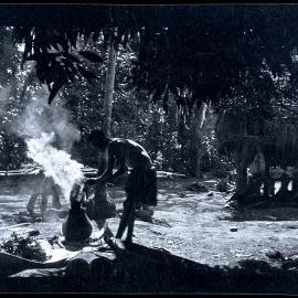 [Manum Island, New Guinea] Moinzo Removing a Petticoat from the Dye