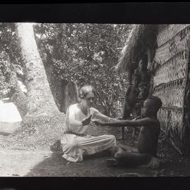 [Manum Island, New Guinea] Self [Wedgwood] Playing Cat’s-Cradle With Another