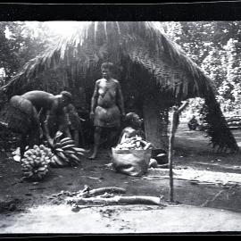 [Manum Island, New Guinea] Preparing Food for a Presentation