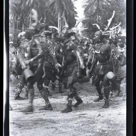 [Manum Island, New Guinea] The Men of Kayan Dance in a Ring