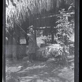 [Manum Island, New Guinea] Zeredo’i (Mandau) Showing how the Gongs are Beaten