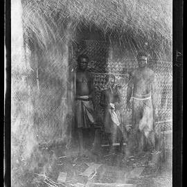 [Manum Island, New Guinea] Joseph, Maswash and Mewo at the Door of CHW’s [Camilla H Wedgwood] House