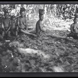 [Manum Island, New Guinea] On the Afternoon of a "Barasi" Day Women Idling on the Beach
