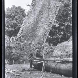 [Manum Island, New Guinea] Another view of the canoe with the mast raised and the perapera fixed in position