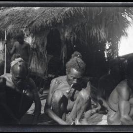 [Manum Island, New Guinea] Two Eelderly Men and ’Asu’asu Sewing a Sail