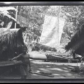 [Manum Island, New Guinea] The Buriata Canoe in Gabuzi's Place with the Sail Hoisted