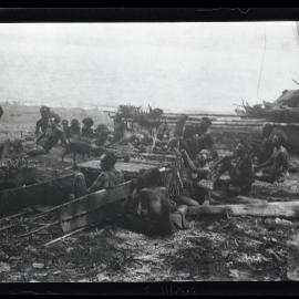 [Manum Island, New Guinea] Mamboti’s Canoe. Decorating the perapera
