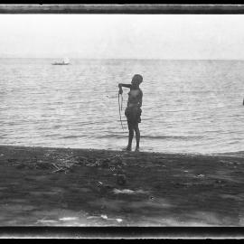 [Manum Island, New Guinea] Tou and Roro Scraping A'u Fibre