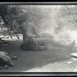 [Manum Island, New Guinea] Idoge Cooking Pig with which Later to Feed the Workers