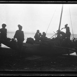 [Manum Island, New Guinea] Putting Pigs Aboard a Buonaputa Canoe