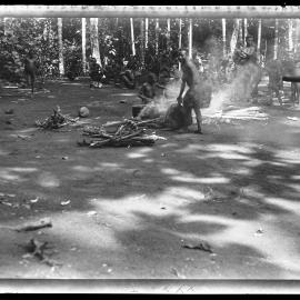 [Manum Island, New Guinea] Putting the Pots on to Boil for Cooking Pig